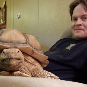 Instructor Micha Petty with Sulcata